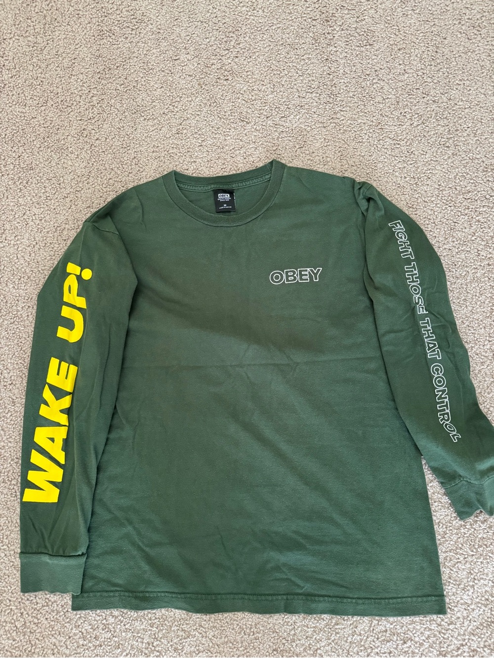 Obey Men's Forest Green Long Sleeve Graphic Tee with Yellow Sleeve Print